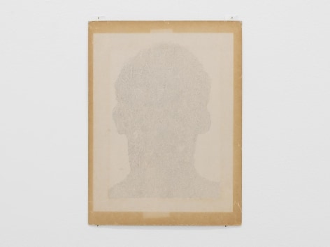 An drawing on paper that is framed by the chipboard that the paper is glued to. The drawing itself is a silhouette of a human head defined by abstract shapes and lines.