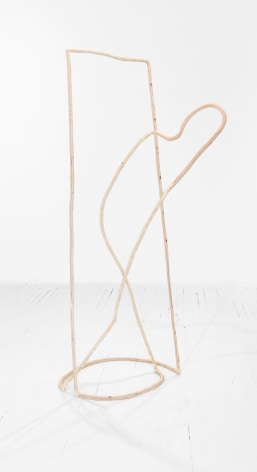 A standing sculpture of an abstract human silhouette, peeking it's head out of a tall square. Made of plywood to resemble a single line
