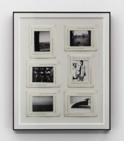 6 small photographs enclosed within a black frame
