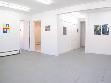 A photograph of the main gallery with 6 works in and around the main room, with 2 open doorways at left