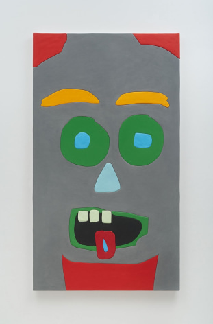 A gray background that upon it has a face. There are yellow eyebrows, green eyes, a blue triangle nose, and an open mouth with the tongue out and 3 teeth on the top register. It is very cartoonish.