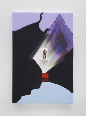 A photograph of an artwork that is mostly black, with a photograph of a figure in the center. There seems to be light surrounding the figure, and a small red square beneath it. There is some purple in near the top of the piece that is painted and collaged on.