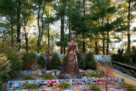 Araminta With Rifle And V&egrave;v&egrave;,&nbsp;2017, installation of&nbsp;Joyce J. Scott: Harriet Tubman and Other Truths, Grounds for Sculpture, Hamilton Township, NJ (October 22, 2017 -&nbsp;April 1,&nbsp;2018)