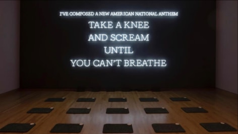 Installation view of Nicholas Galanin, Neon American Anthem, 2023, Seattle Art Museum, Washington
