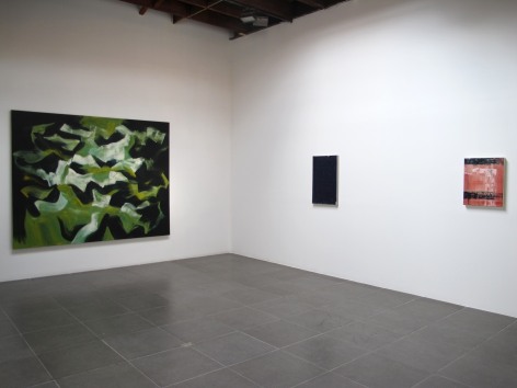 Installation of the art exhibition &quot;Heat Waves&quot; with 3 paintings on white walls