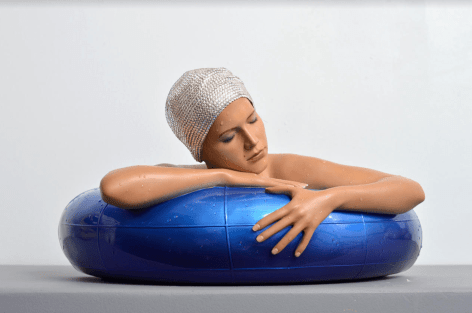 Carole Feuerman Oil and resin with Swarovski Crystals. Miniature Serena Swarovski Crystal cap (Blue Inner-tube) 10 x 17 x 8 inches.
