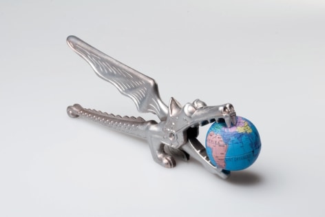 Hale Tenger, World Cracker, 1992, Russian nut cracker, toy globe, 7 x 22 x 4 cm