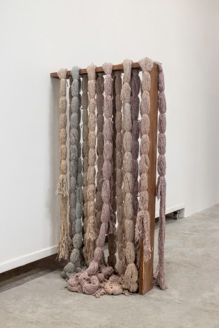 Afra Al Dhaheri, 1 Minute intervals, 2023, Dyed cotton ropes on stained wood, 110 x 11 x 60 cm
