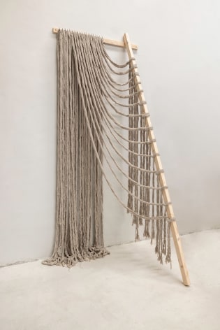 Afra Al Dhaheri, Sway and fall No. 1, 2023, Cotton rope on wood, 235 x 100 x 106 cm (long wood 266 cm)