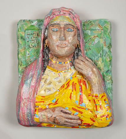 Michael Rakowitz, May The Obdurate Foe Not Be In Good Health (Limestone Funerary Bust), 2020, Middle Eastern food packaging and newspaper, with glue on panel, 55 x 45 x 13 cm