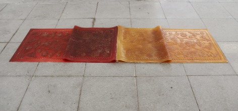 Rossella Biscotti, Mei, 2019, Installation of two natural rubber sheets, food coloring, 59 x 235 cm each