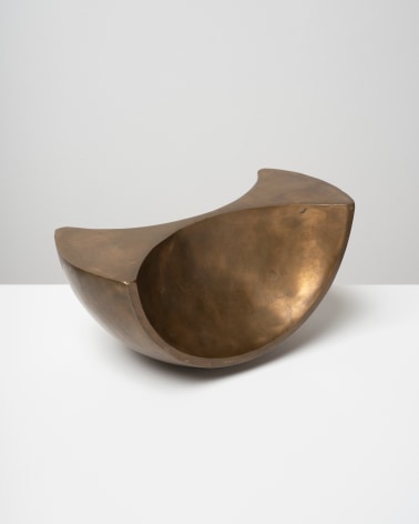 This is an image of a bronze sculpture made by Ruth Vollmer in 1968 titled: Figure of Half Revolution.