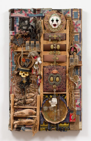 This is an image of an assemblage made by Noah Purifoy in 1998 titled: Clown Princess.