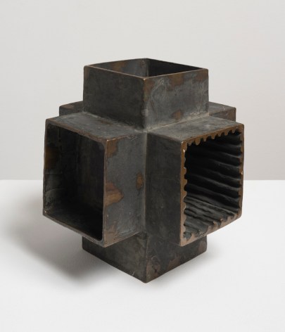 This is an image of a bronze sculpture made by Ruth Vollmer in 1964 titled: Interposed Cross (Series II).