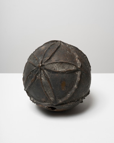This is an image of a bronze sculpture made by Ruth Vollmer in 1964-66 titled: Wounded Sphere.