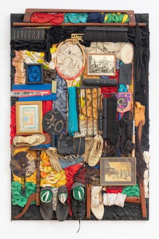 This is an image of a mixed media assemblage made by Noah Purifoy in 1989 titled: Rags &amp; Old Iron I (after Nina Simone).