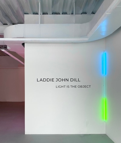 installation view of Hopefully Spring (1971) with &quot;Laddie John Dill, Light is the Object&quot; on the wall