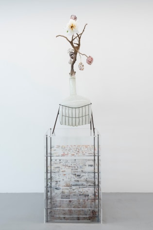 Jesse Krimes Of Beauty and Decay; or, not (white), 2018 glass, steel, tree root, artificial plant, transparency film, digital print, acrylic 17 x 24 x 81 in.