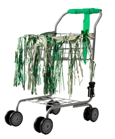Holly Harrell  Crannies, 2020  Small Shopping cart, fringe skirt, deflated balloon, crepe paper streamer  16 x 22 x 12 inches