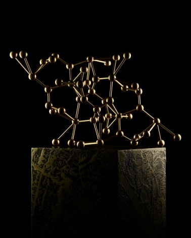 Fine Mineral photograph of a brass vanadinite molecular model for wilensky exquisite minerals habits exhibition.