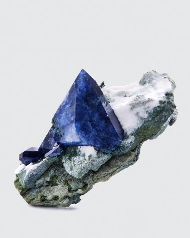 Benitoite on Natrolite on white background