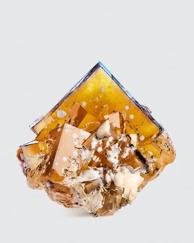 Fluorite with Barite inclusions on white background