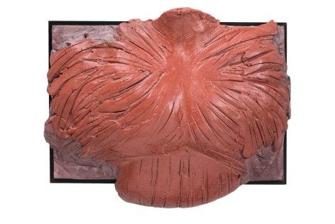 Deity XXXIII deity in red and mauve clay over plaster