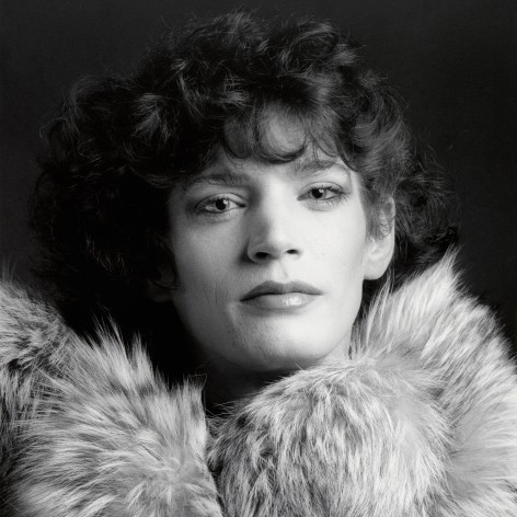 Self-Portrait in makeup and fur collar.