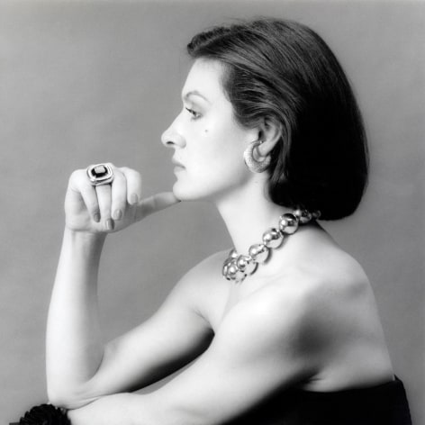 Portrait of Paloma Picasso in profile.