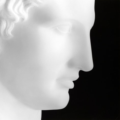 Statue in profile.