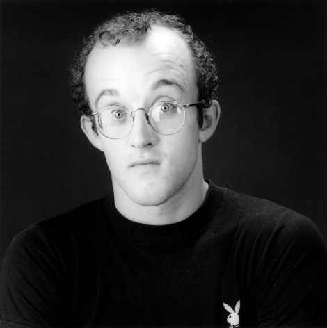 Portrait of Keith Haring, eyes wide open.