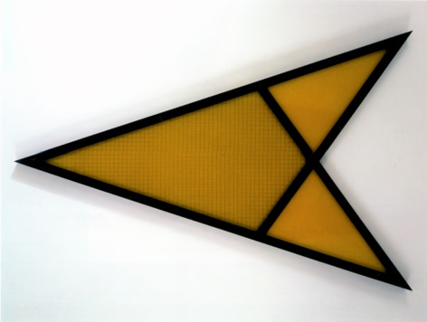 Sculpture of a yellow arrow with black edges.