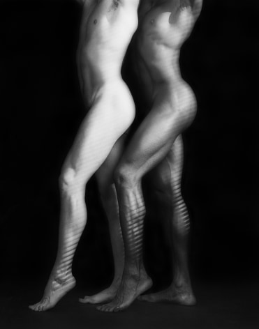 Ken and Tyler posing next to each other nude.