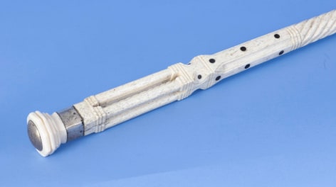 Whale ivory and whale bone carved shaft cane with whale ivory capstan shaped grip and whalebone shaft, circa mid-19th century