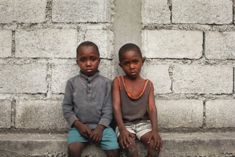 EARTHQUAKE ORPHANS: Orphans of the January 12th earthquake are gathered in a field next to Lycee Jacques, a primary school. They are under the care of FRADES, a grass roots organization which is providing foster care, Croix Des Bouquets, Haiti,&nbsp;2010.