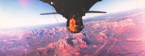 2.&nbsp;Howard Sochurek (1924-1994), Air Force instructor rolls a trainer flying over Humphrey&rsquo;s Peak, c. 1956