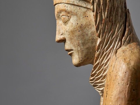wood sculpture of woman