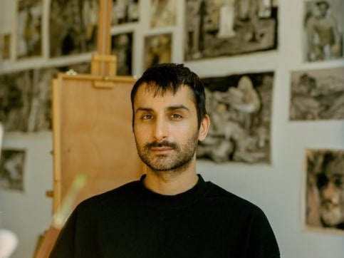 Portrait of Salman Toor in his studio