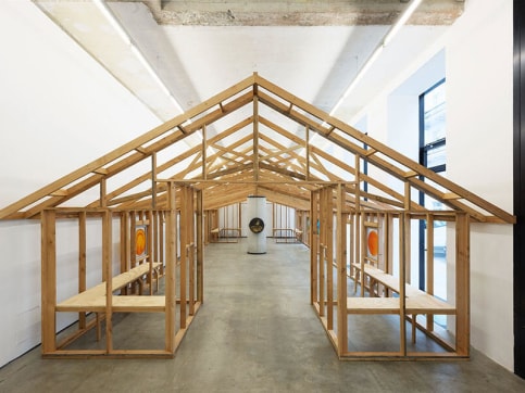 Base structure of a pitched roof building, made with wood planks