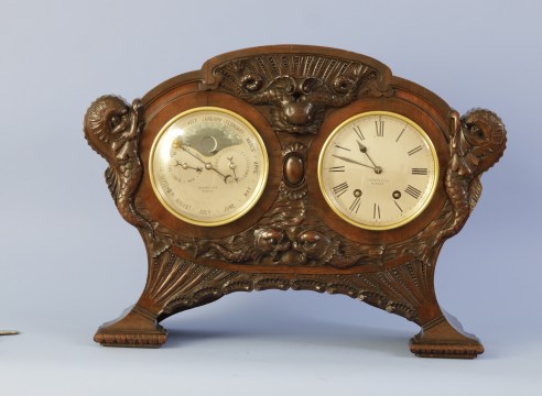 Tiffany Striking Clock with Clock and Calendar Matching Brass Bezels on the Original Carved Base with Nautical Themes, Circa 1910