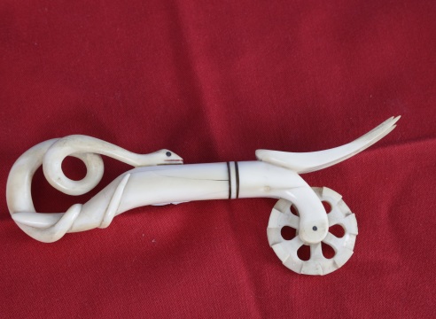 Whale Ivory Pire Crimper with Winding Serpent and Fork, American circa 1860, Circa 1860