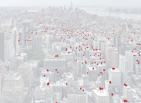 Aerial photo of lower of Manhattan, with architectural details highlighted in red.