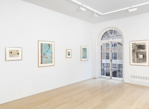 installation view with multiple framed works