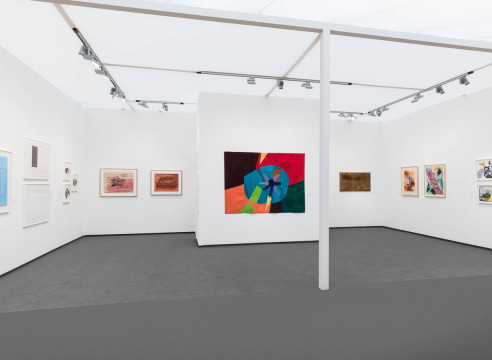 installation view of various artworks on an art fair wall