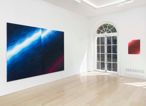 installation view of two paintings