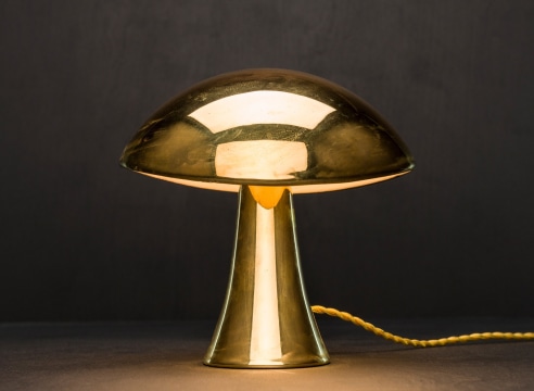 Gold table lamp turned on