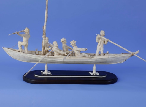 Whale Bone Model of a Crewed Whale Boat, probably American, late 19th/early 20th century WHALEBONE MODEL OF A MANNED WHALE BOAT with Plank-on-Frame Construction. and Highly Detailed Whaleman.