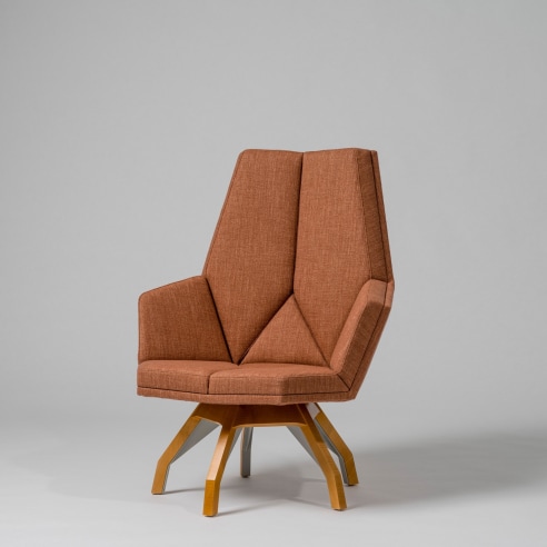 Wood based upholstered lounge chair by Pierre Paulin