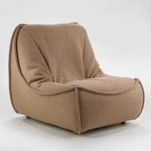 photograph of a chair by Govin in a blank room, chair is brown and has no arms