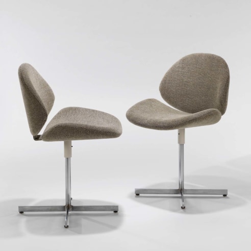 photograph of 2 chairs by Fermigier in a blank room
